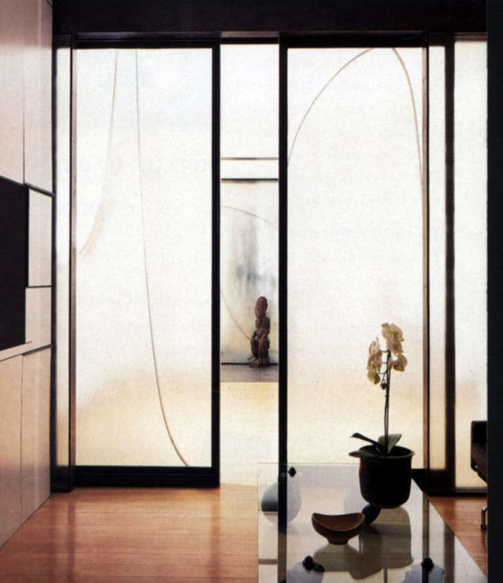  Freund Apartment, New York City. The media room in the foreground is entered through a pair of sliding glass doors. The glass has been hand-sandblasted and hand-sealed to give an irregular diffuse effect.